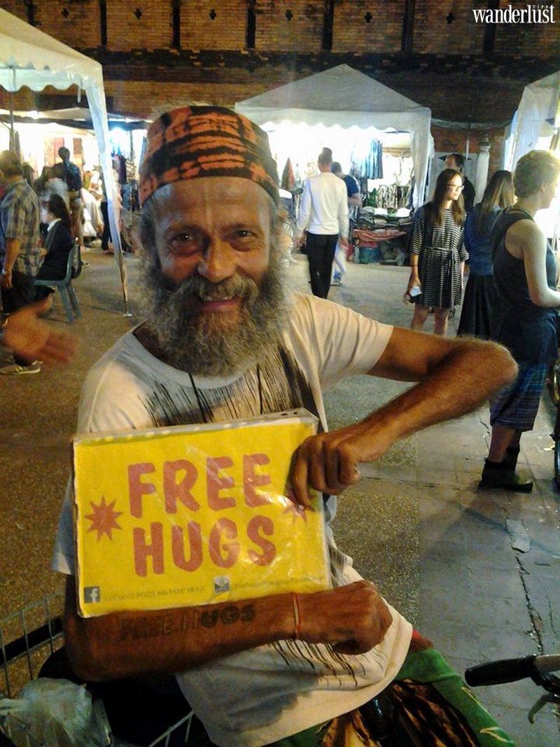 Wanderlust Tips Magazine | A homeless man and his free hugs