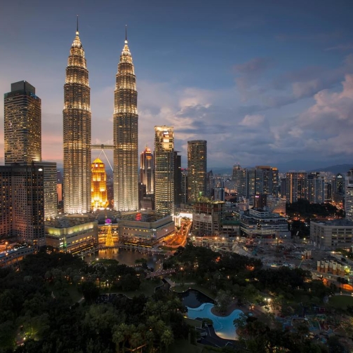 The Petronas Twin Towers in Kuala Lumpur, Malaysia, are an iconic symbol of the city's modern identity.