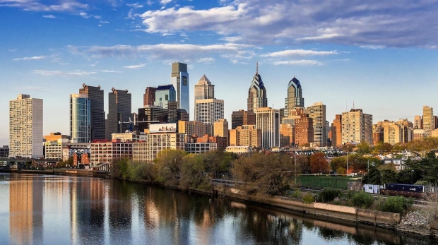 A wide shot of the Philadelphia skyline with the Comcast Technology Center and One Liberty Place